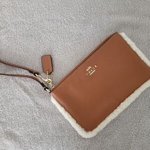 Coach wristlet with Faux fur